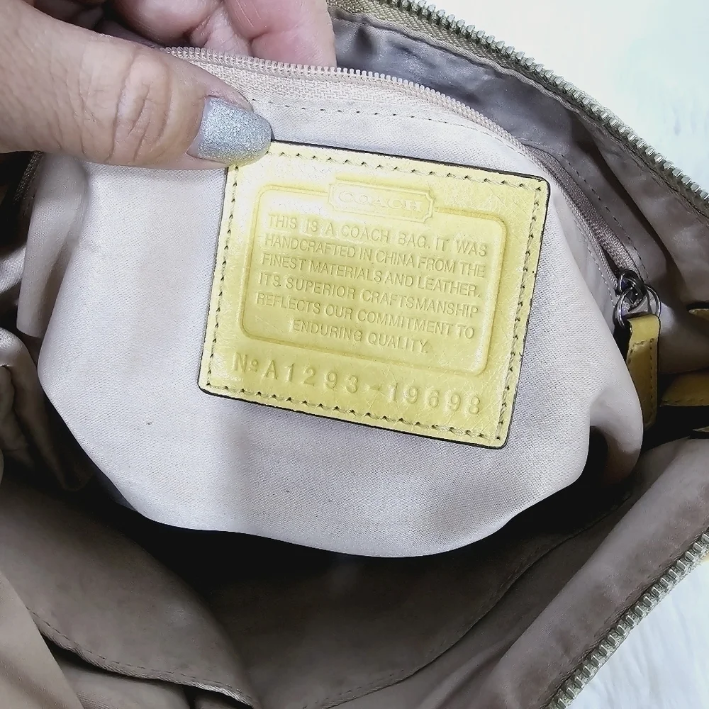 Coach yellow and tan satchel bag